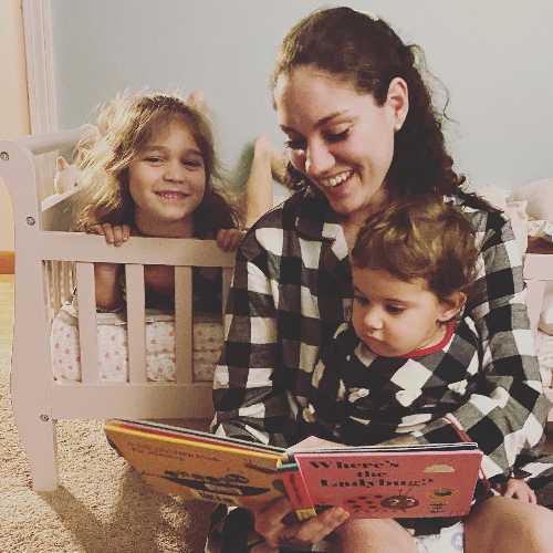 Sam's wife reading books to the kids